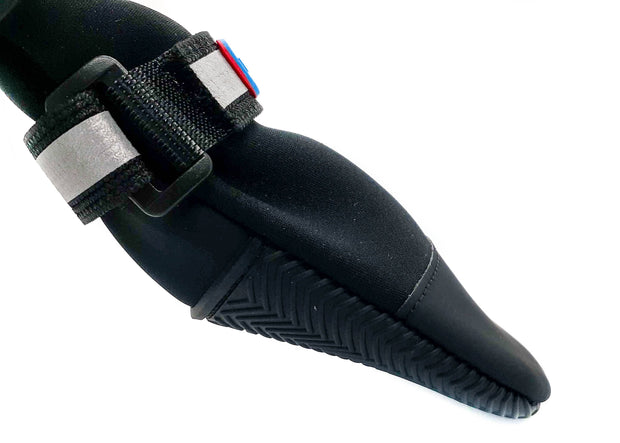 Close-up of Bark Brite neoprene dog booties on paws