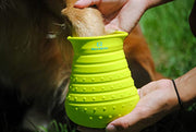 Close-up of Bark Brite dog paw scrubber and grooming brush